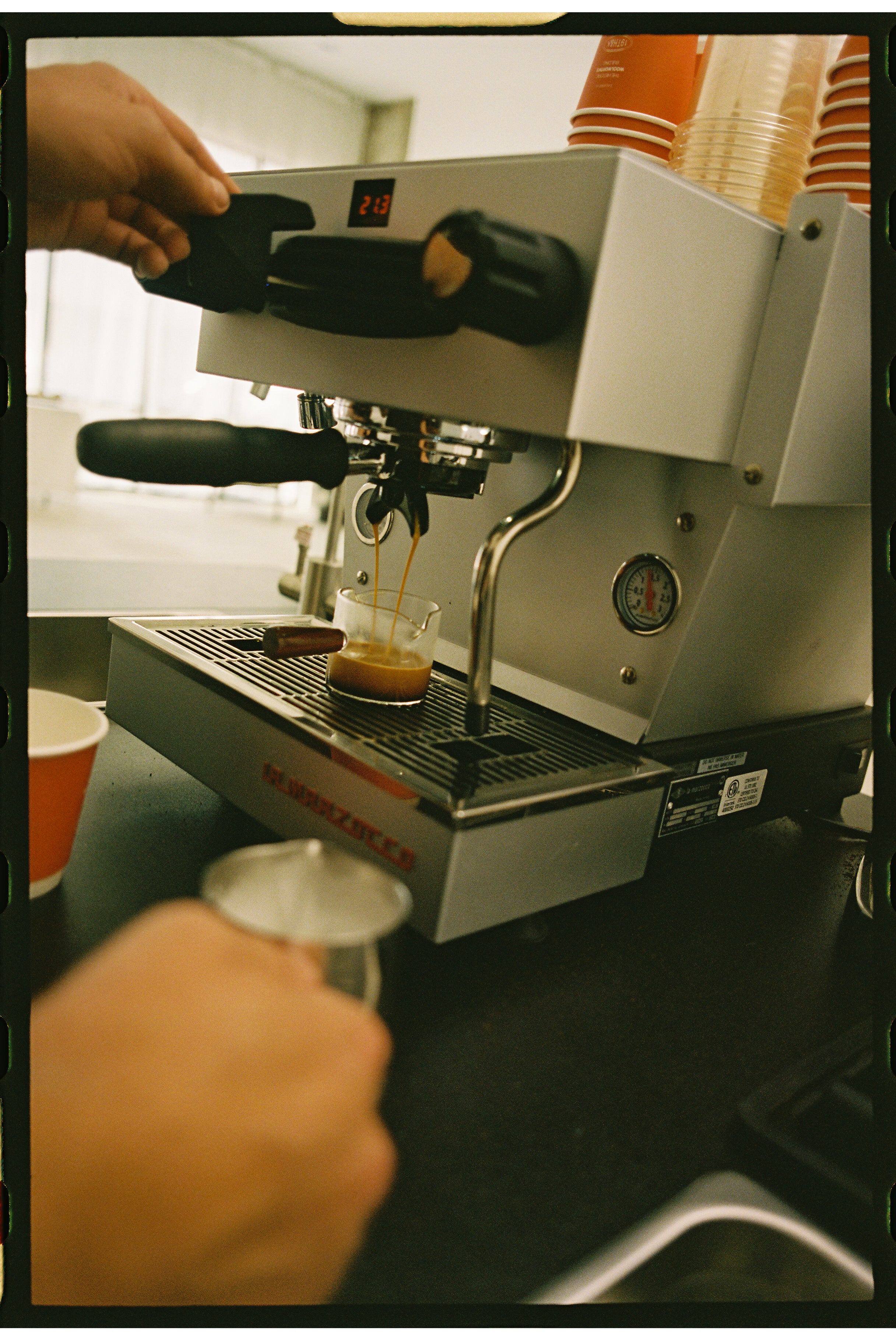 La Marzocco espresso machine preparing a shot of espresso